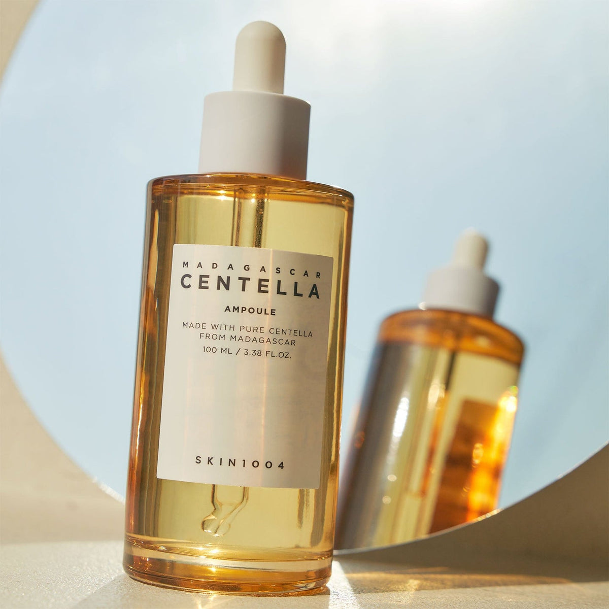 SKIN1004 Madagascar Centella Ampoule 100 ml bottle with mirror reflection — manufacturer photograph